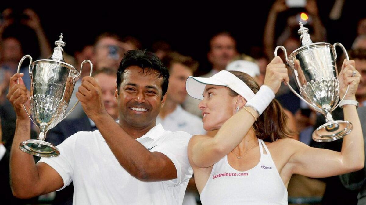 Still learning tennis from Hingis, says Paes