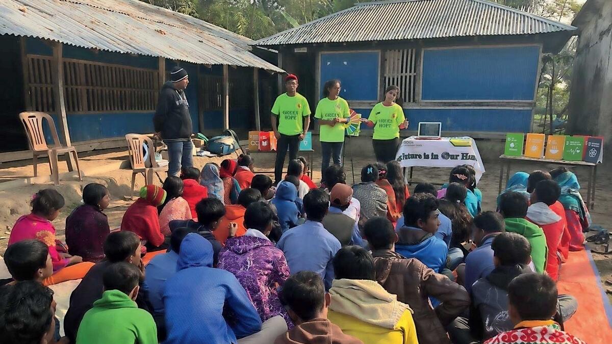 Green Hope members hold a community workshop in a rural village as part of their volunteer work. 