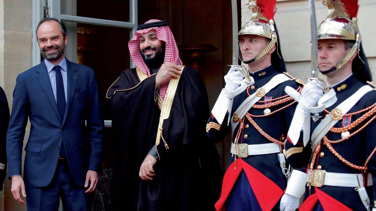 French Prime Minister Edouard Philippe welcomes Saudi Crown Prince Mohammed bin Salman as he arrives at the Hotel Matignon in Paris on Monday. — Reuters