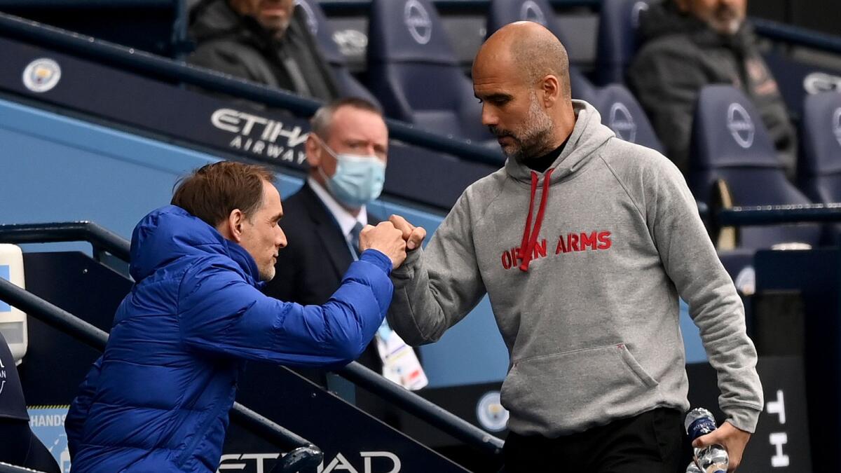 Chelsea's head coach Thomas Tuchel (left) and Manchester City's head coach Pep Guardiola are ready for big contest. — AP