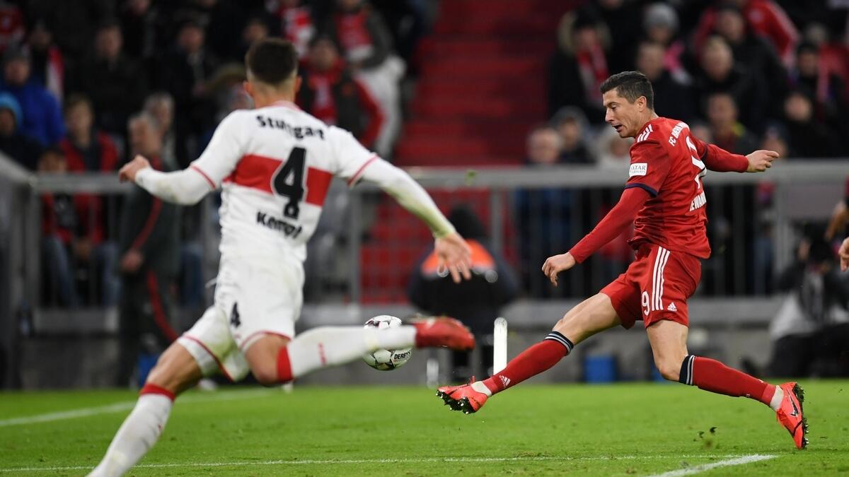 Lewandowski makes amends as Bayern trim Dortmunds lead
