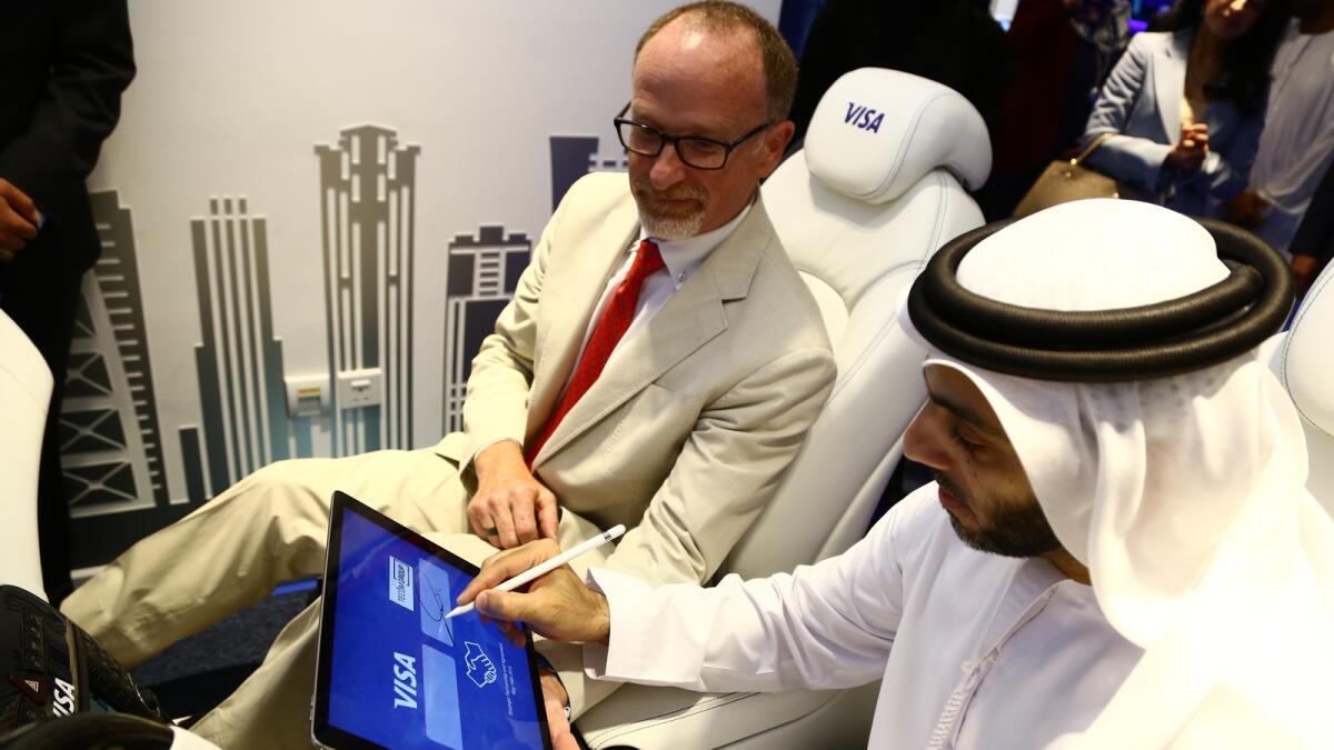 Jim McCarthy, global head of innovation and strategic partnerships, and Malek Al Malek at MoU signing ceremony during the launch of Visa's innovation centre n Dubai on Monday. 