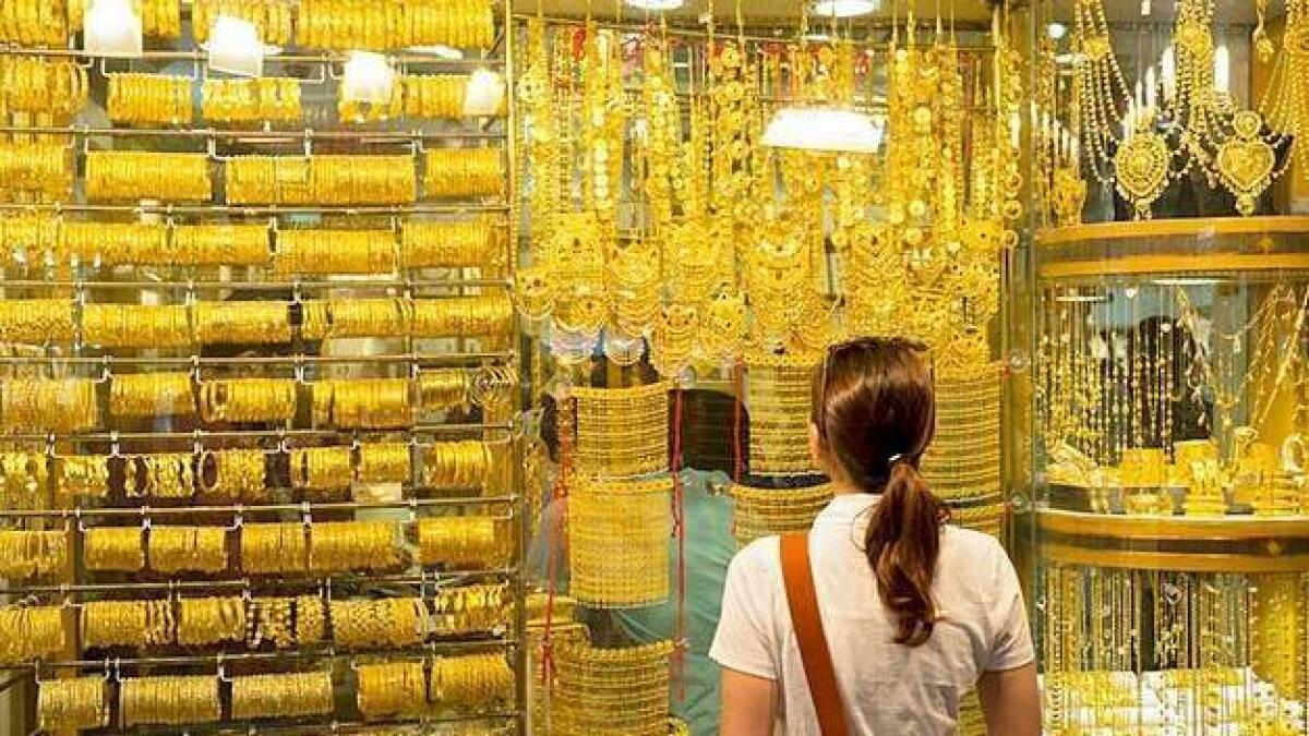 Dubai gold prices dip as dollar gains, 22k priced at Dh145