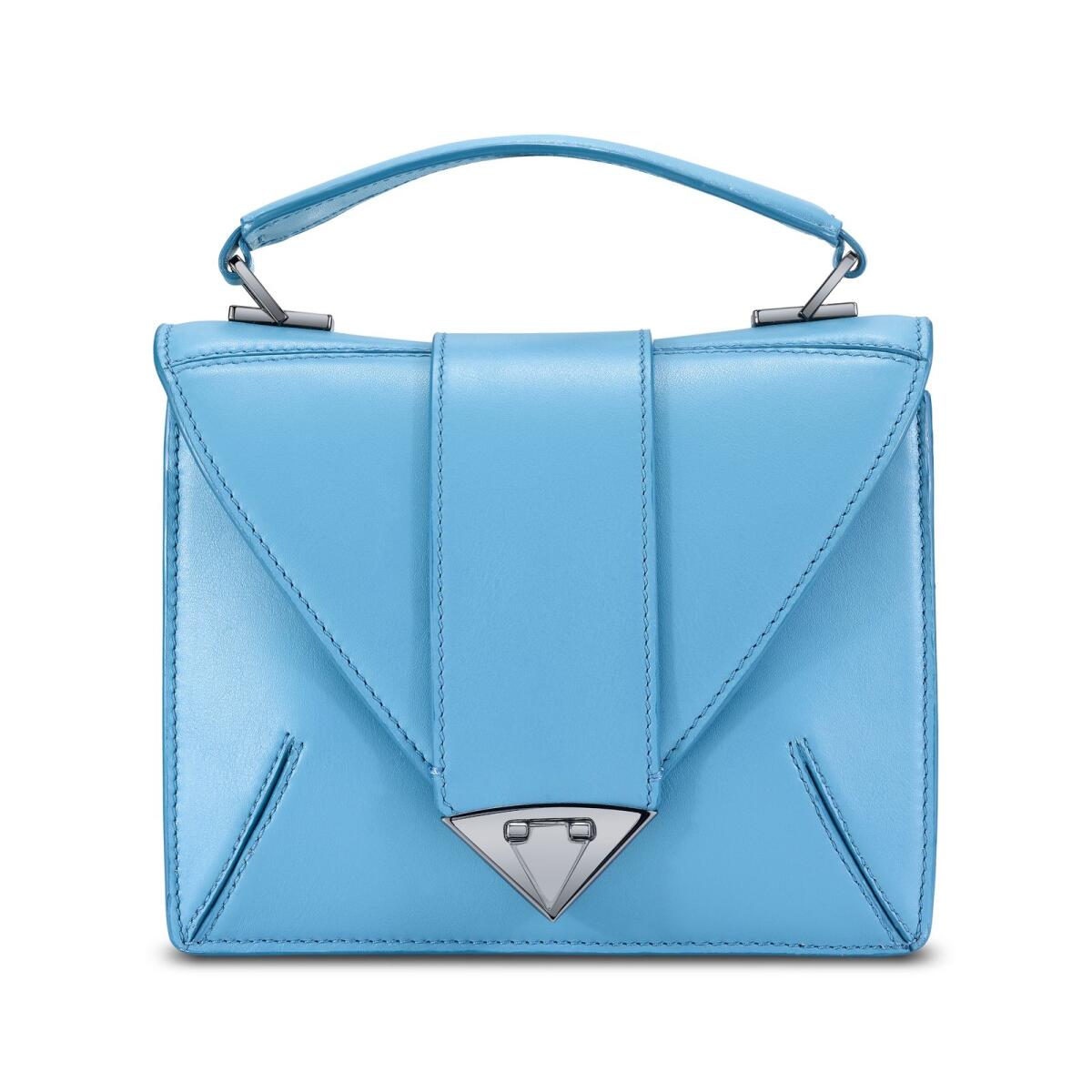 This exquisitely crafted Rita Small Handbag Santorini Leather captures the spirit of celebration with a seamless blend of tranquil blue tones. Dh9,181