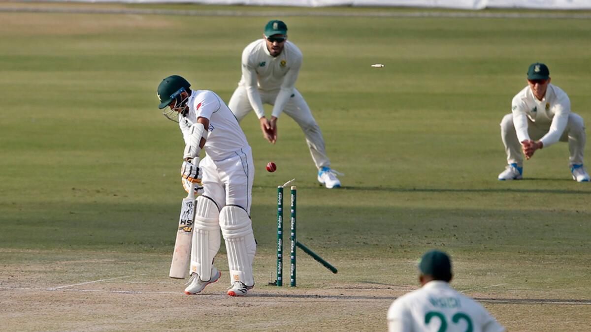 Pakistan's batsman Abid Ali is bowled out by South Africa's pacer Kagiso Rabada during the first day of the first Test match at the National Stadium, in Karachi, Pakistan on Tuesday. — AP