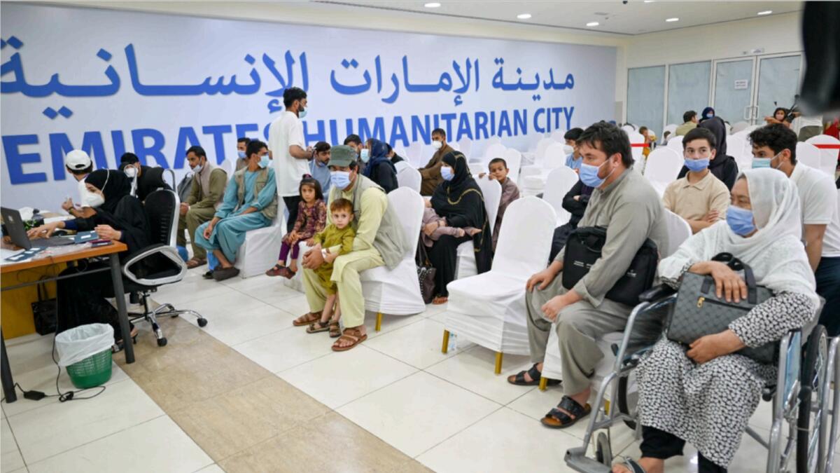 Afghans evacuated from Kabul airport at Emirates Humanitarian City in Abu Dhabi. — Photo by Ryan Lim