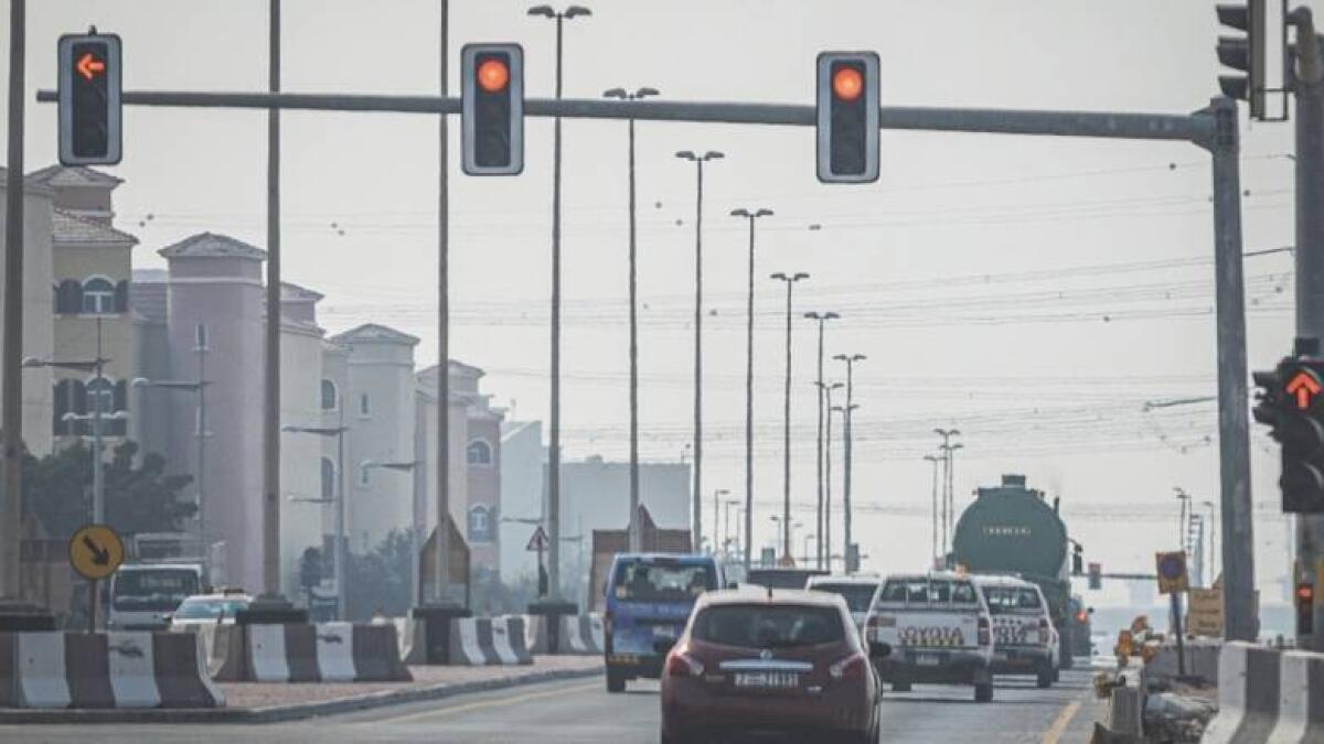 Jumping a red signal by heavy vehicles.-Photo by Neeraj Murali/Khaleej Times