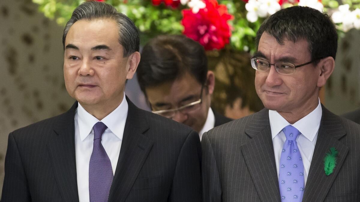 Japan, China say trade war will harm world economy