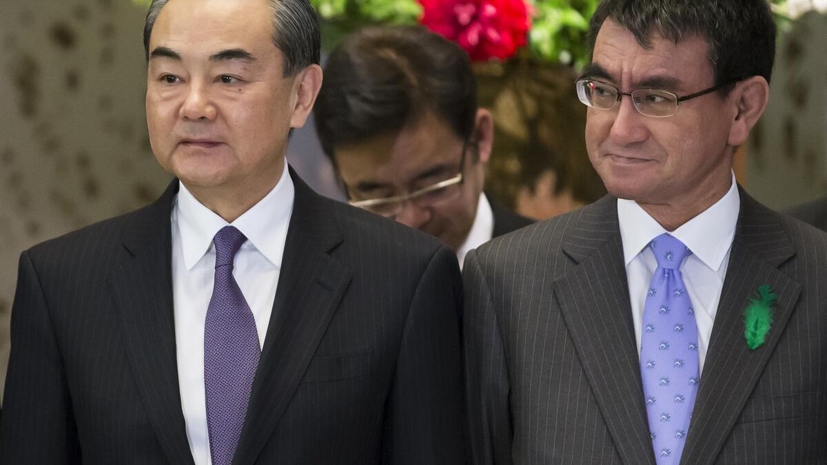 Japan, China say trade war will harm world economy