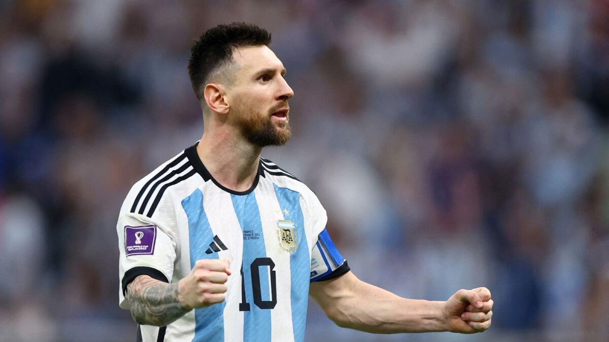Lionel Messi celebrates scoring a penalty during the penalty shootout against France in the World Cup final. — Reuters
