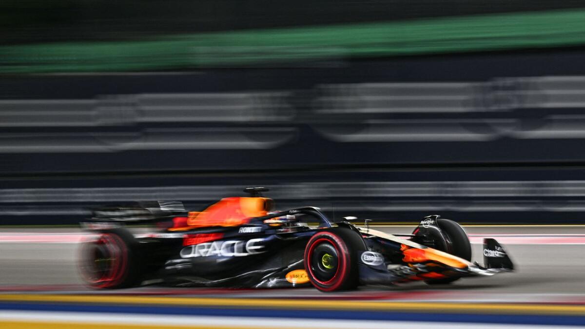 Red Bull Racing's Dutch driver Max Verstappen drives during the qualifying session of the Singapore Formula One Grand Prix night race at the Marina Bay Street Circuit in Singapore. — AFP