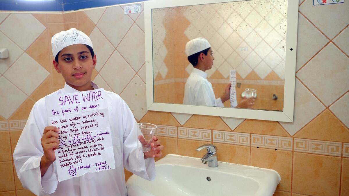 Faiz Mohammed with his checklist on how to save water.- Photo by Shihab