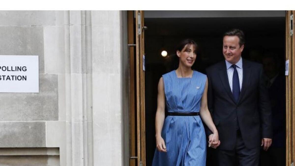 Prime Minister David Cameron and his wife Samantha leave after voting in the EU referendum, at a polling station in central London