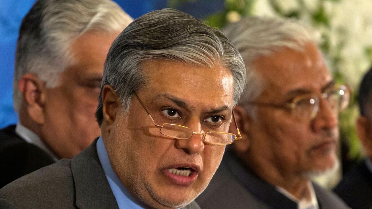 Pakistan's Finance Minister Ishaq Dar has said that all concerned documentation about loan roll over have been completed. — Reuters file