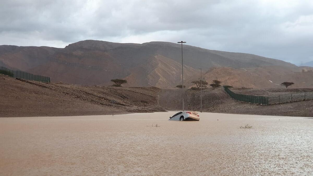 A stranded car in the flood near Jebel Jais in Ras Al Khaimah. Photo by M.Sajjad/Khaleej Times