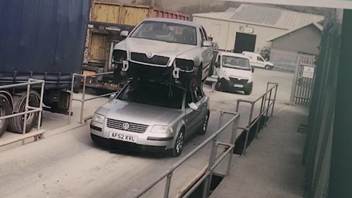 Video: Man fined for strapping car onto his vehicles roof