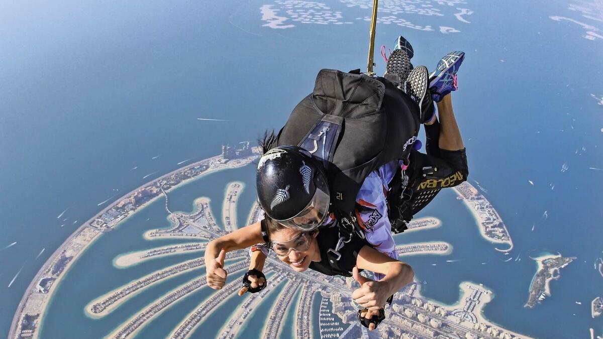 Adventurous tourists can take to skydiving over the Palm Jumeirah. – File photo