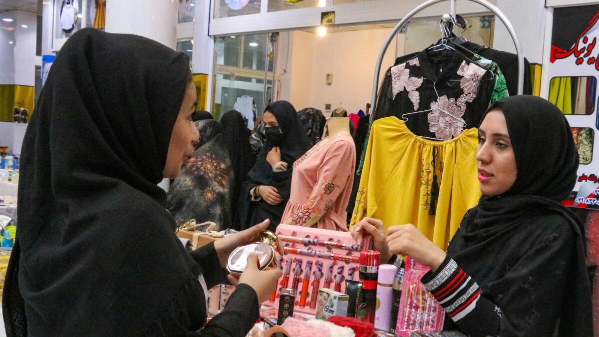 Afghan women sell their handmade crafts at ‘Eid Bazar’ in Herat. — AFP