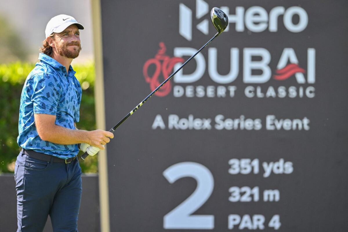 Tommy Fleetwood of England plays his tee shot at the 2nd hole during the first round of the Hero Dubai Desert Classic. - AFP)