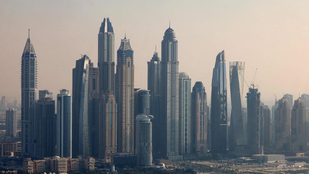 A picture taken from 'The View at Palm' overlooks the Marina and skyscrapers in the Dubai. The CBRE report said as many as 7,812 residential units were delivered in Dubai during the January-March quarter. — AFP file photo