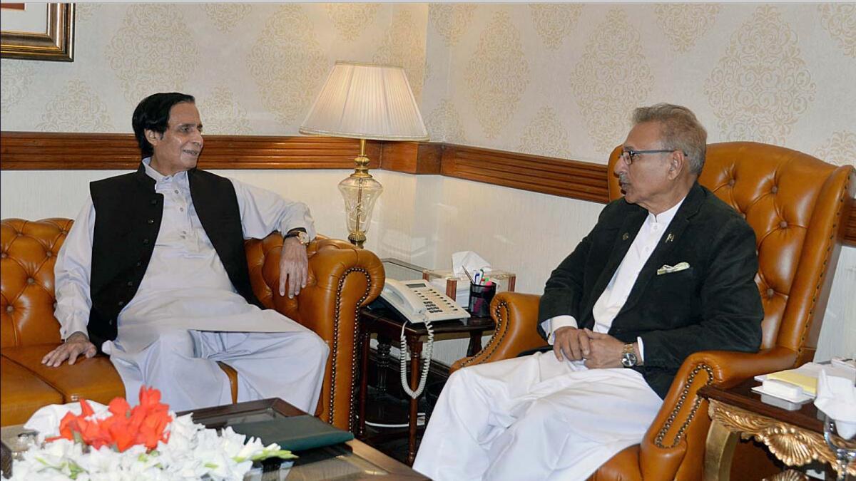 Punjab province Chief Minister Pervaiz Elahi in a meeting with Pakistan President Arif Alvi in Lahore. — APP file
