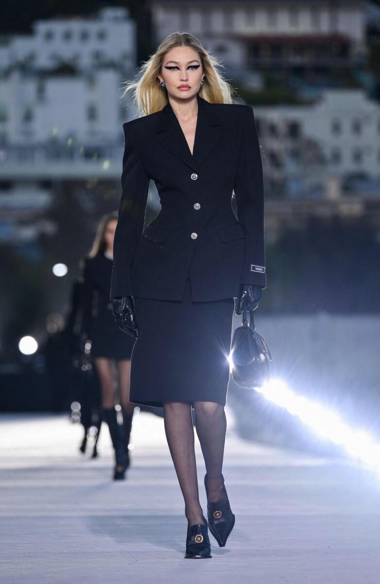 Gigi Hadid models a Versace creation