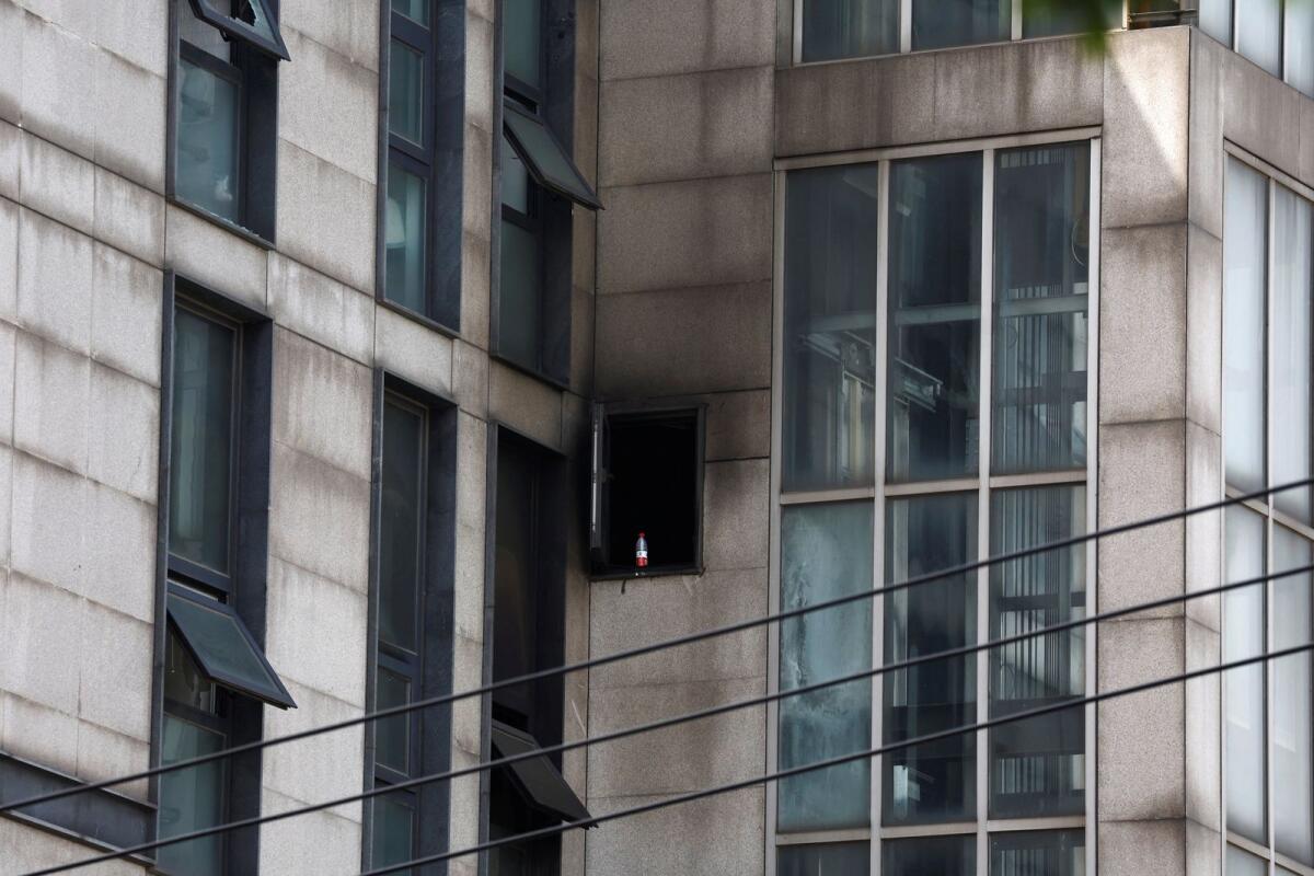 Damaged windows are seen following a fire at the Changfeng Hospital, in Beijing, China April 19, 2023. Photo: Reuters