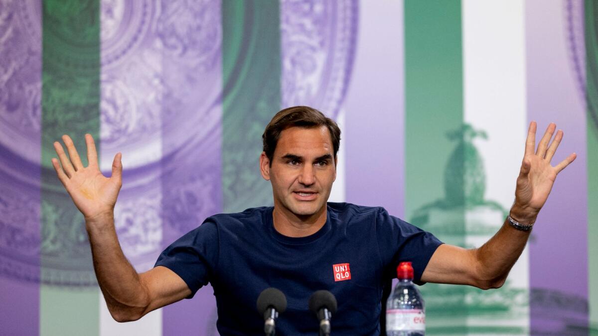 Roger Federer attends a press conference on Saturday. (AP)