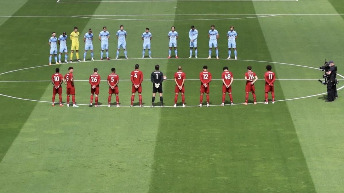 Liverpool and Burnley players observe a minute's silence in respect for the late Jack Charlton before the match. - Reuters