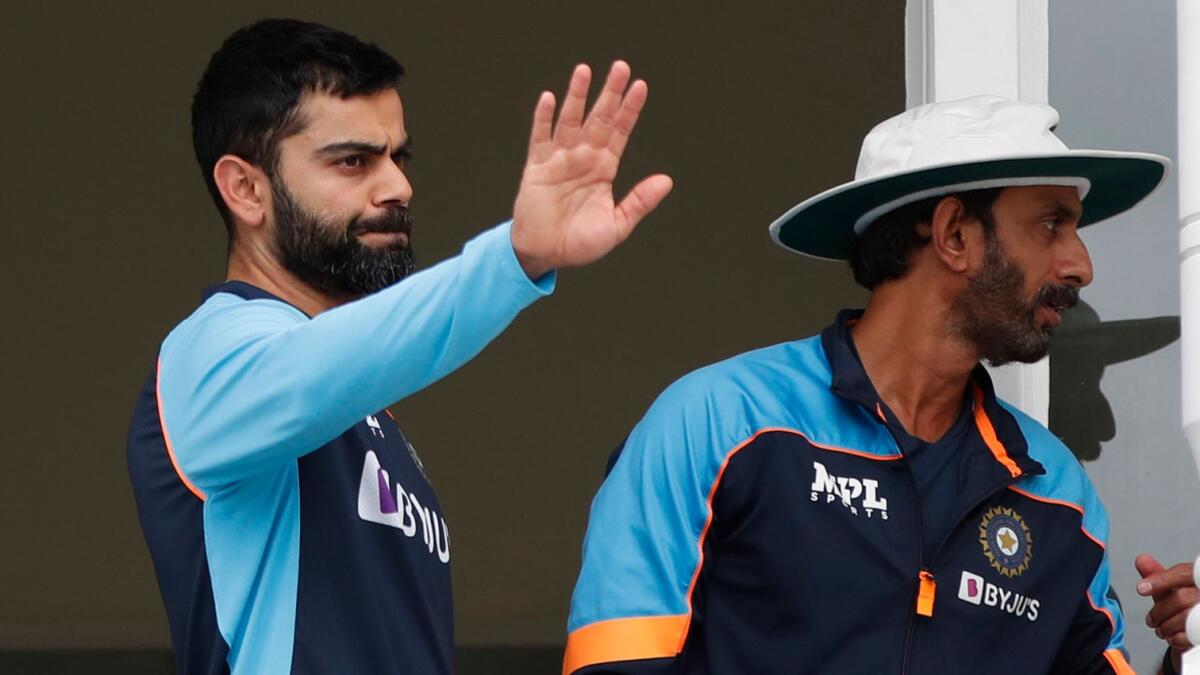 India's Virat Kohli and batting coach Vikram Rathour at the ground. — Reuters