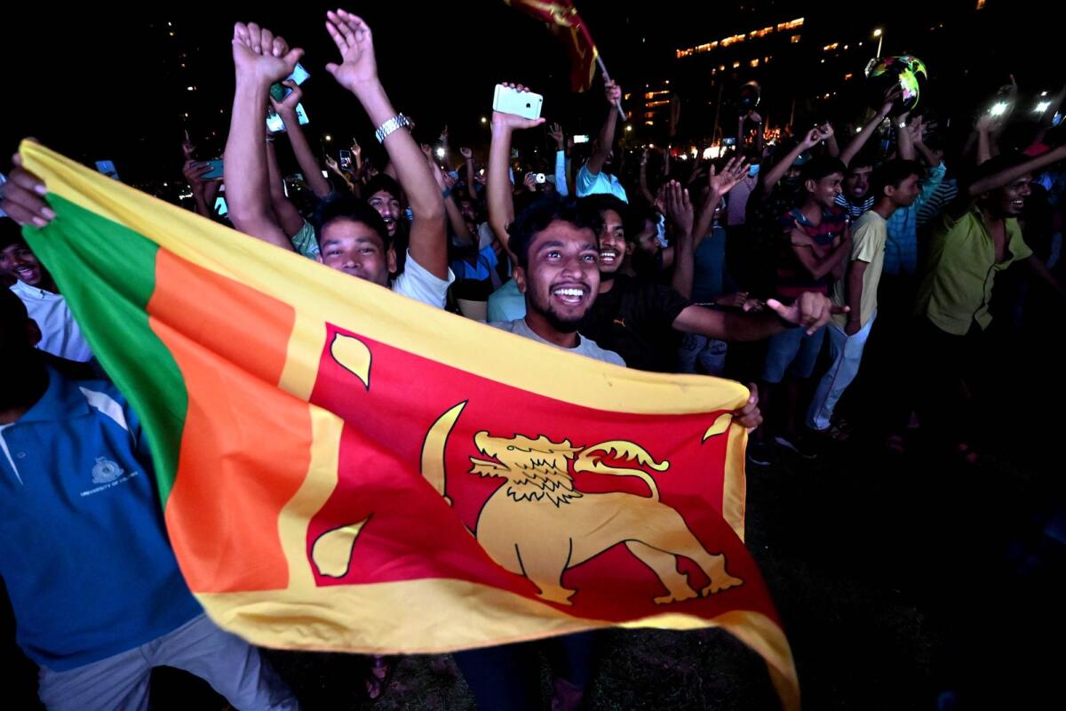 Sri Lankan cricket fans celebrate their victory in Colombo. (AFP)