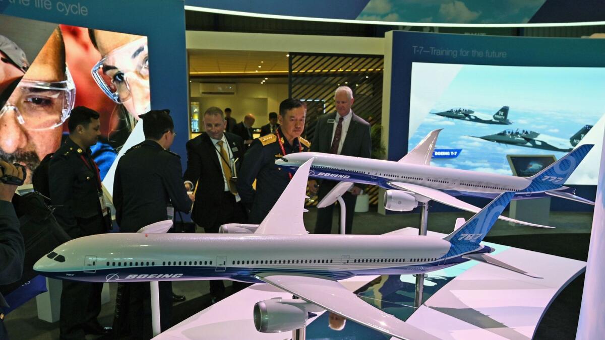Boeing 777 and 787 airplane models are exhibited at the Singapore Airshow in Singapore. — AFP file photo