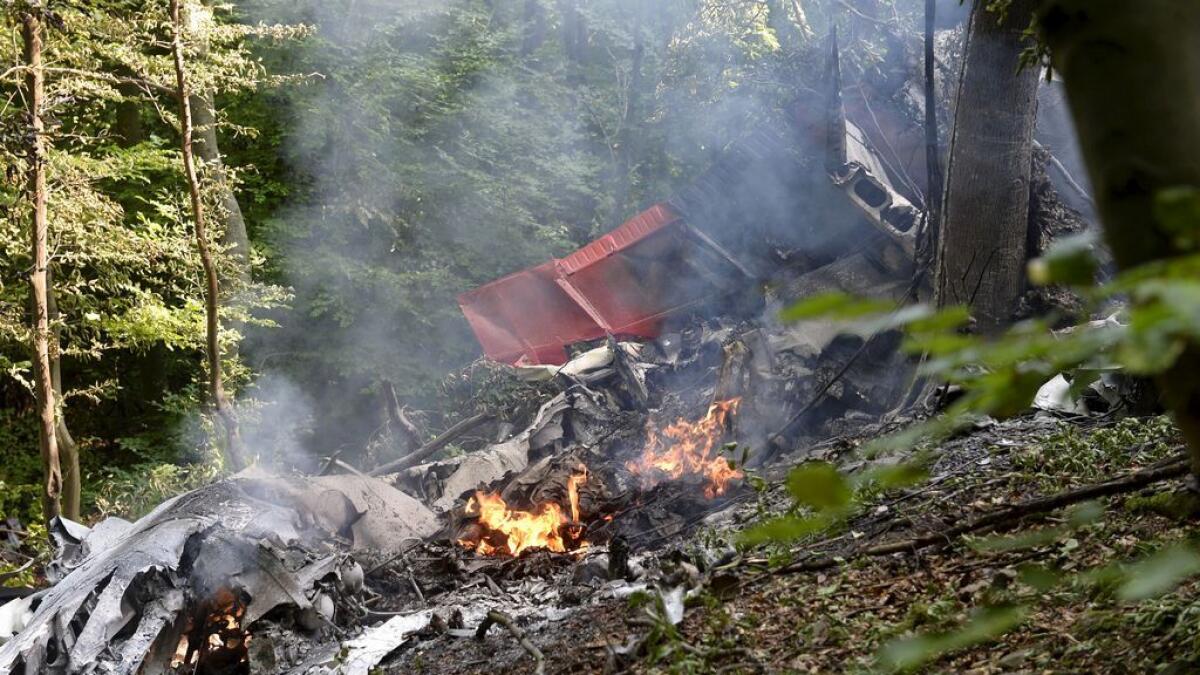 Debris of two sport planes is seen near the village of Cerveny Kamen, Slovakia
