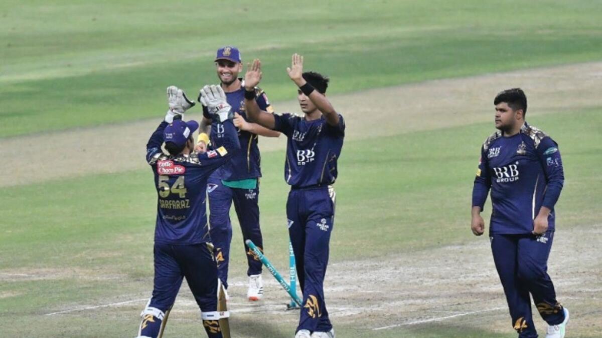 Quetta Gladiators players celebrate a wicket. (PSL Twitter)