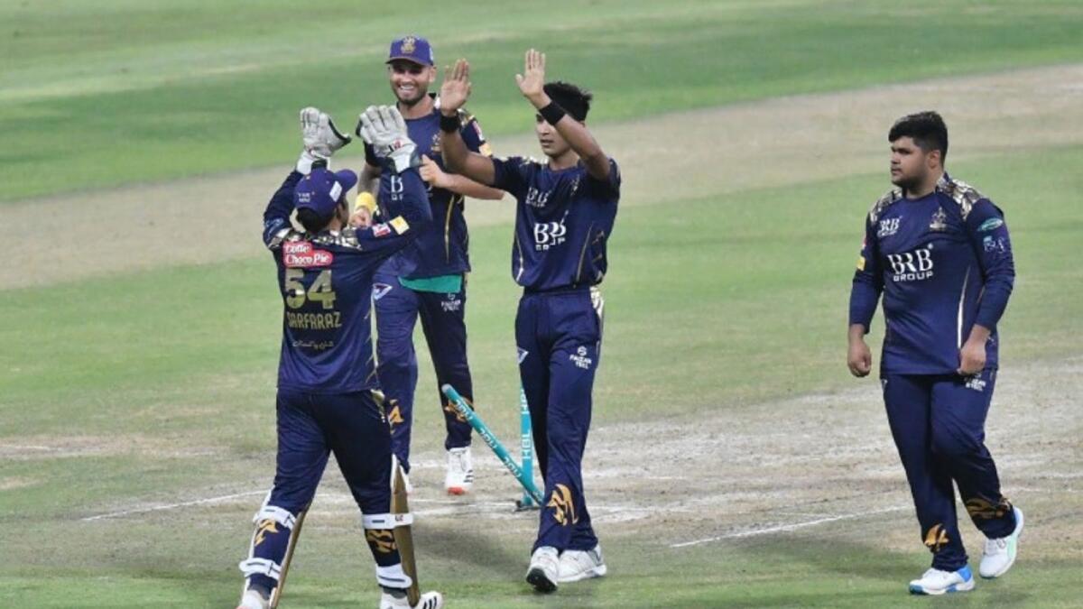 Quetta Gladiators players celebrate a wicket. (PSL Twitter)