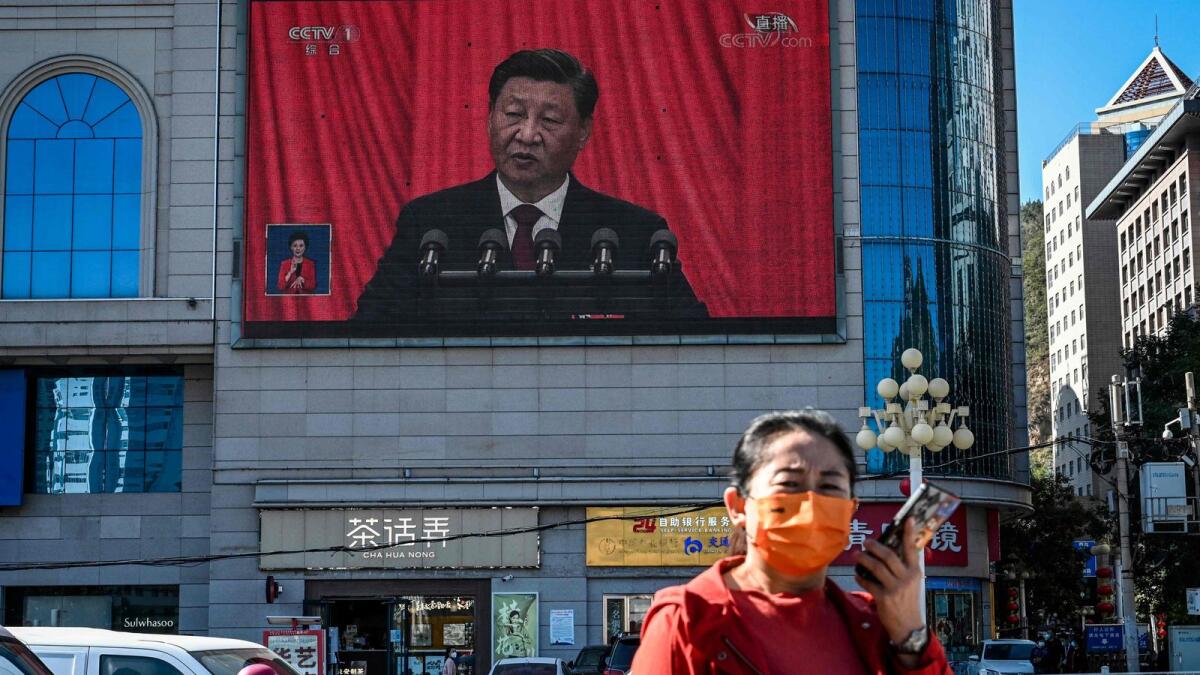An outdoor screen shows the live speech of Chinese President Xi Jinping during the opening session of the 20th Chinese Communist Party Congress, in Yan’an city, in China’s northwest Shaanxi province. — AFP file