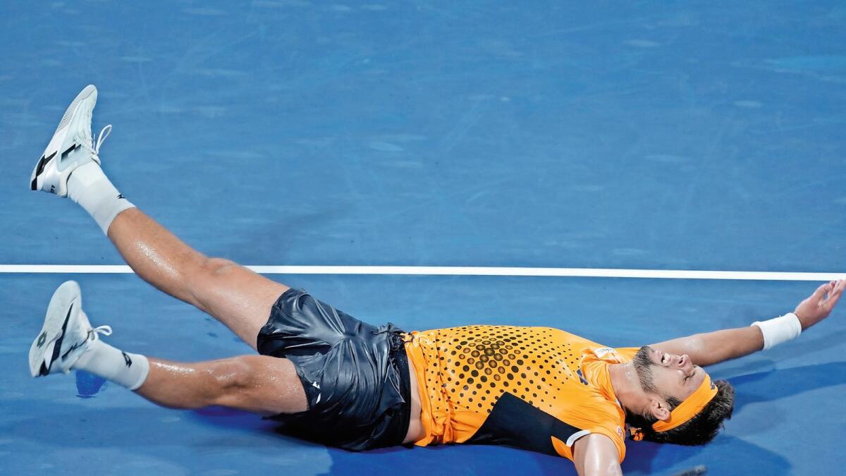 Yet to sink in: Czech Republic’s Jiri Vesely celebrates after defeating Serbian Novak Djokovic in the quarterfinals of the ATP Dubai Duty Free Tennis Championships on Thursday night. — AP