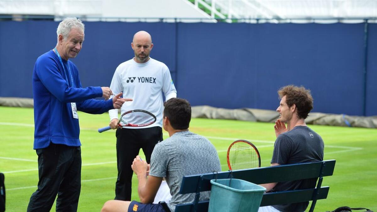 Tennis: Murray warms up with Beckhams son