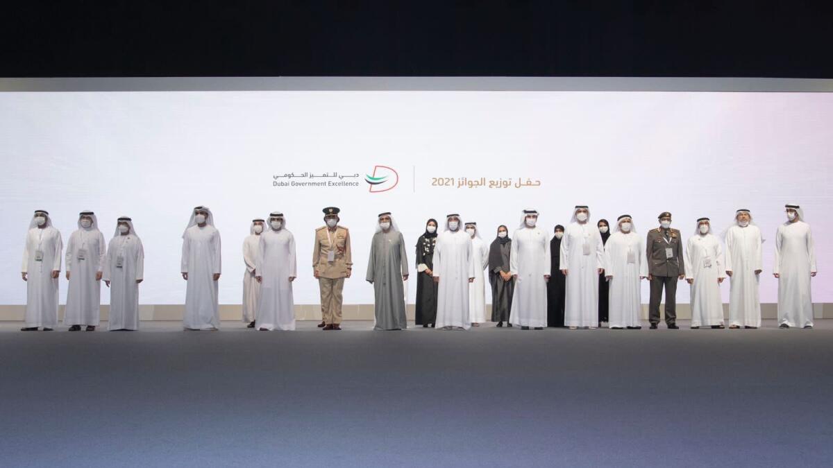 Sheikh Mohammed with the winners of the Dubai Government Excellence Programme. — Courtesy: Twitter/Dubai Media Office