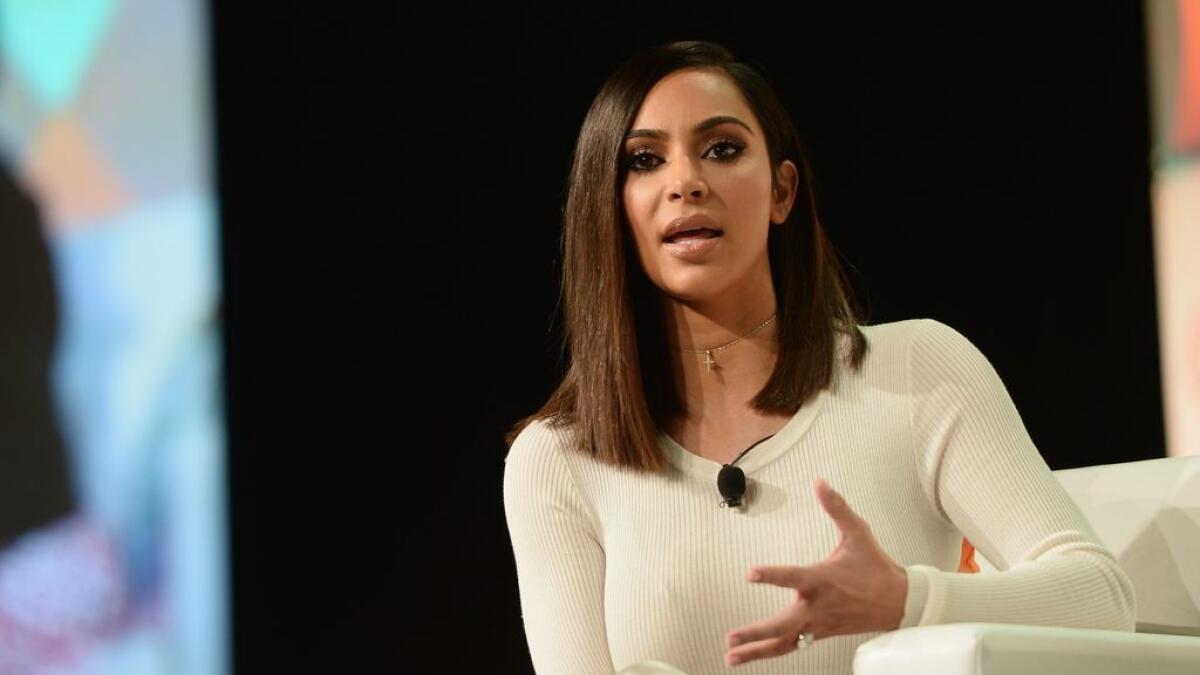 Reality star Kim Kardashians abs are fake, sprayed on 