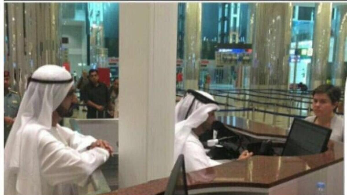 Dubai Airports employee was 'not busy on phone', but working during Shaikh Mohammed visit