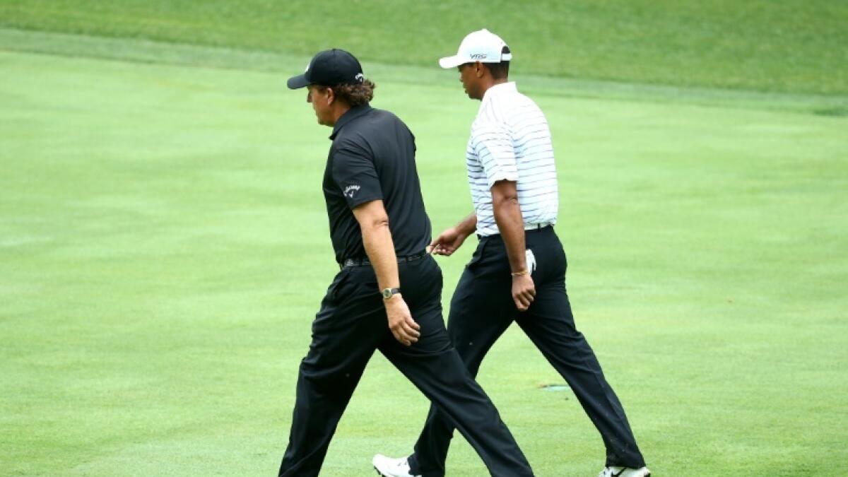 Phil Mickelson (left) and Tiger Woods could meet in a rematch of a 2018 made-for-television event. - AFP file