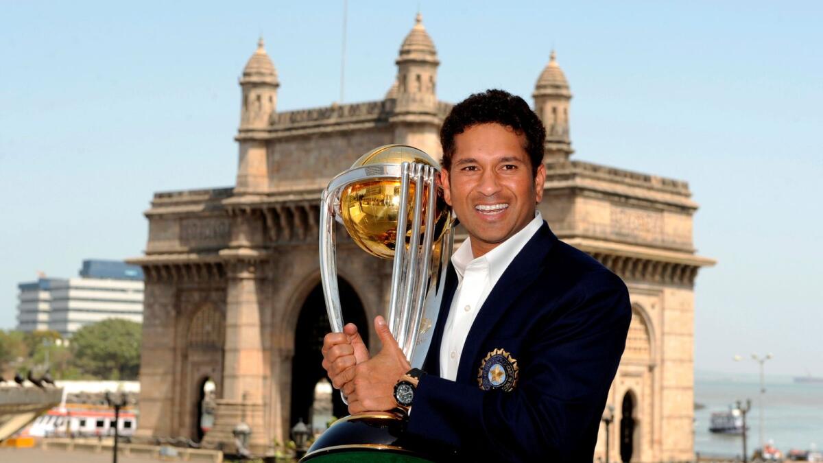 Sachin Tendulkar holds the World Cup trophy after India defeated Sri Lanka in the 2011 World Cup final in Mumbai. (Reuters file)