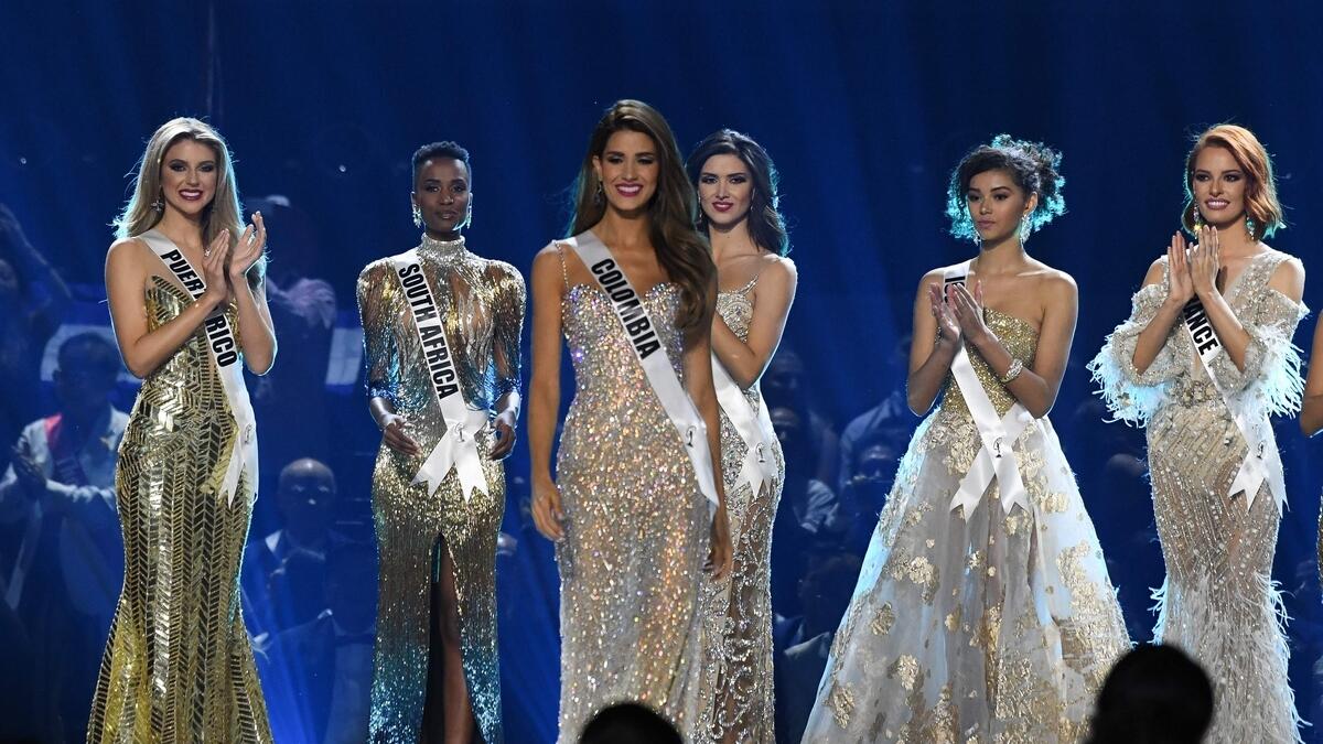 The two favorites ahead of the competition, Miss Thailand Paweensuda Saetan-Drouin and Miss Philippines Gazini Ganados, did not make it to the final 10.