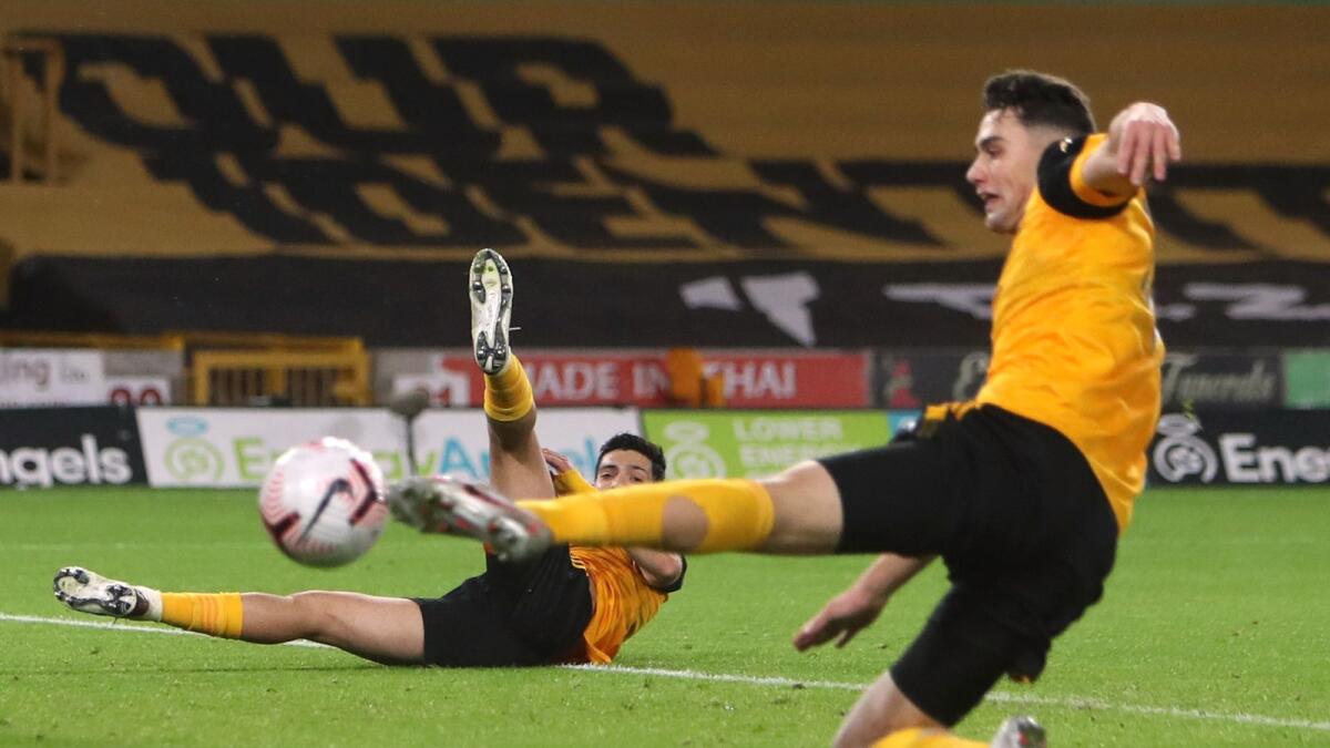 Wolverhampton Wanderers' Raul Jimenez and Max Kilman in action on Friday night.