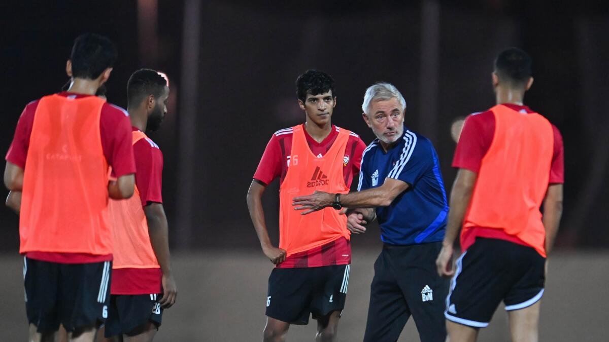 UAE coach Bert van Marwijk with his players during a training session in Dubai. — UAEFA Twitter