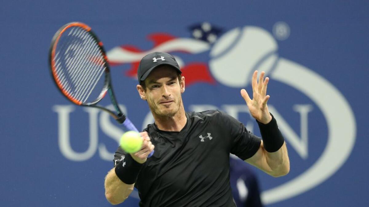 Andy Murray of Great Britain returns a shot against Lukas Rosol of Czech Republic on day two of the 2016 U.S. Open tennis tournament at USTA Billie Jean King National Tennis Center.