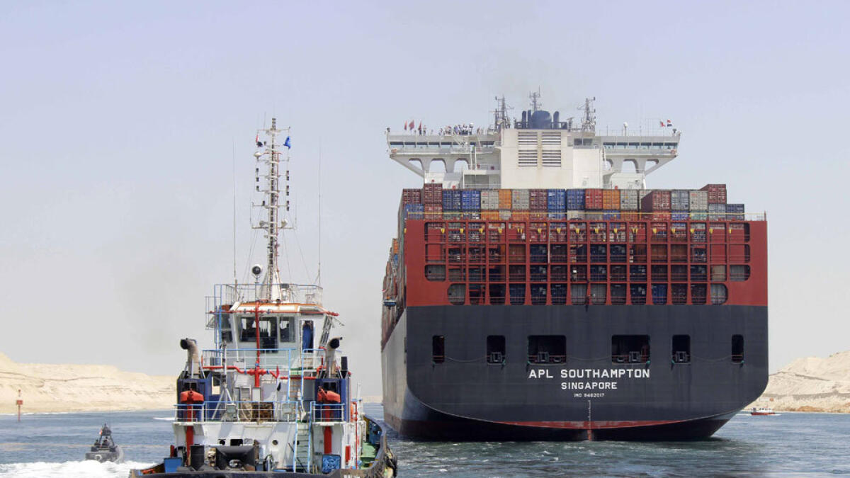 Ships cross Egypts New Suez Canal in first test-run