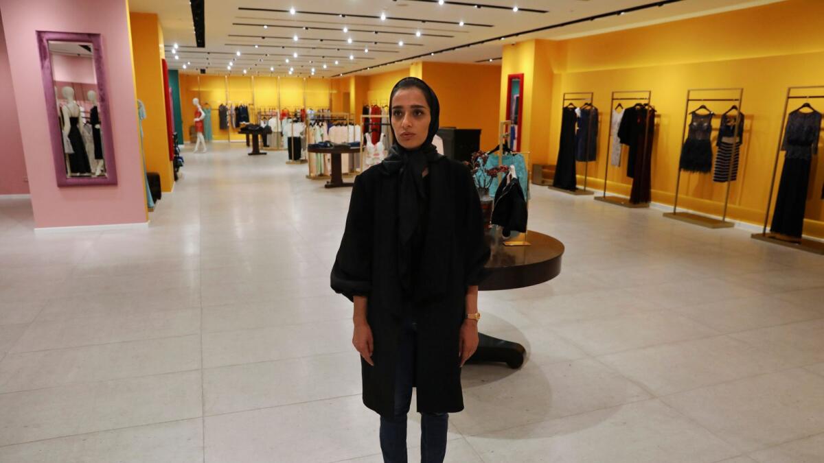Nasrin Hassani, a clothing designer and seller in a women’s clothing store at Tehran Mall shopping center, in Tehran.