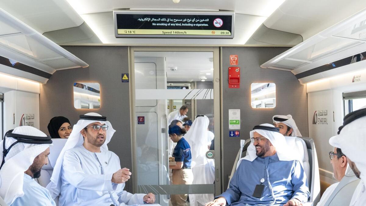 Sultan Al Jaber and other officials during the Etihad Rail's first journey between the cities of Abu Dhabi and Al Dhannah. — Wam